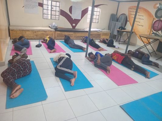 Mathare youths meditation and yoga.